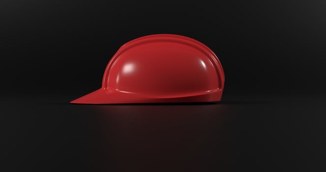 red safety helmet or hard cap isolated on black background. 3d render and illustration of headgear and handyman tools photo