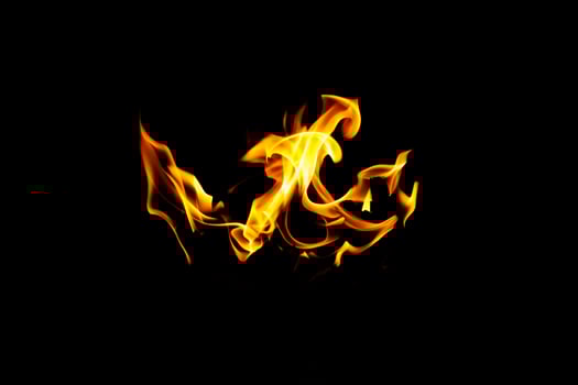 Fire flame texture. Burning material backdrop. Burn effect pattern. Blaze and torch wallpaper. Heat and haze backdrop. photo