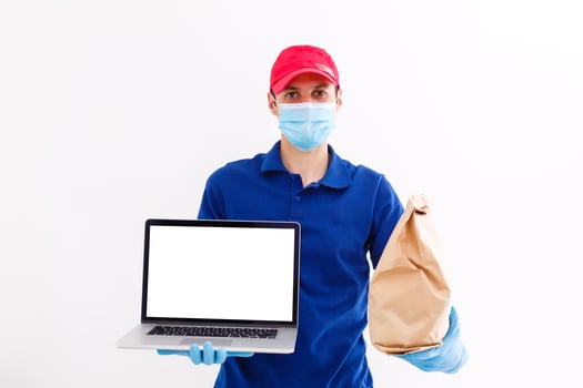 Workplace with laptop on table at home web designer or artist. Concept of a freelance and creative work online photo
