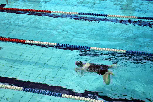 Swimming in the swimming pool photo