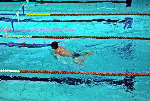 Swimming in the swimming pool photo
