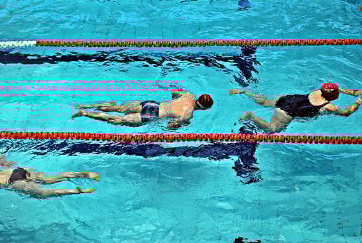 Swimming in the swimming pool photo