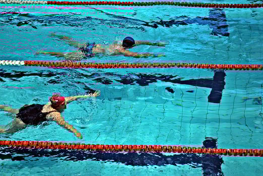Swimming in the swimming pool photo