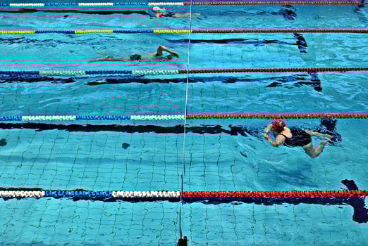 Swimming in the swimming pool photo