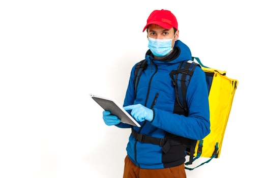 delivery man send food bag at door knob for contactless or contact free from delivery rider in front house for social distancing for infection risk. photo