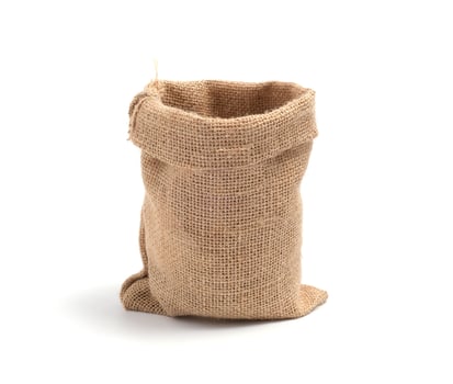 Brown empty sack bag, small isolated on white background photo