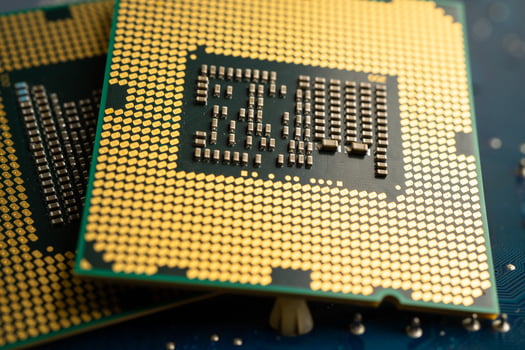 CPU, central processor unit chip Chip on circuit board in PC and laptop computer technology. photo
