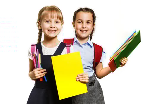 Two little schoolgirls. Education, fashion, friendship concept. photo