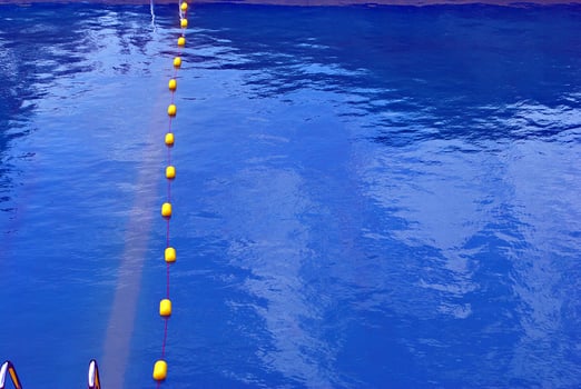 Blue ripped water in swimming pool photo