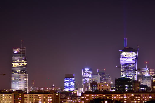 View of at night glass buildings and modern business skyscrapers,. View of modern skyscrapers and  business buildings in downtown. Big city at night. photo