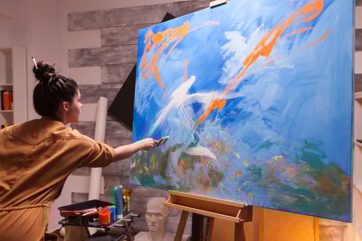 Successful artist painting in art workshop with innovative imagination. Modern artwork paint on canvas, creative, contemporary and successful fine art artist drawing masterpiece photo