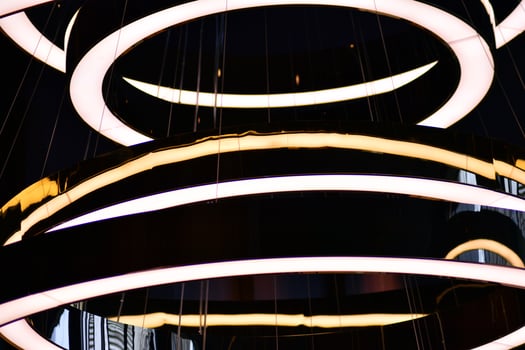 Abstract interior fragment. Stylized illumination with modern LED lamps. photo