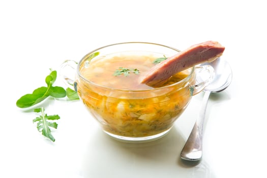cooked smoked pea soup with ribs in a plate photo