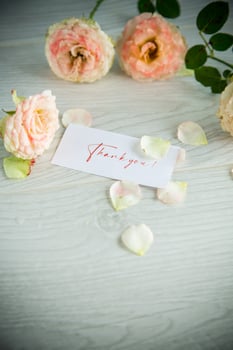 bouquet of beautiful orange roses on table photo