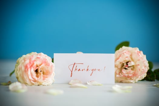 bouquet of beautiful orange roses on table photo