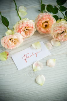 bouquet of beautiful orange roses on table photo