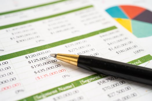 Pen on chart or graph paper. Financial, account, statistics and business data concept. photo