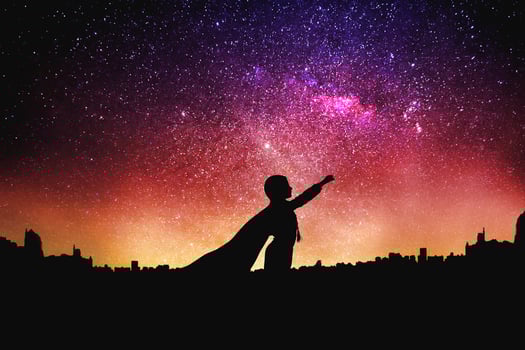 superhero silhouette at the night starry sky background photo