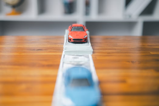 Car loan,money, banknote on agreement document or car insurance application form. Saving money for car concept, trade car for cash concept, finance concept. photo