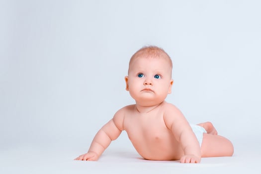 Cute baby girl on white background photo
