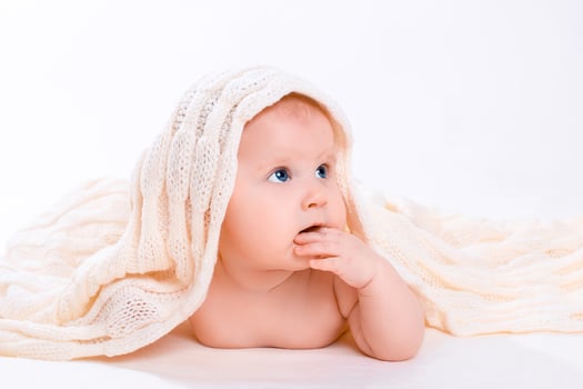 Cute baby girl on white background photo