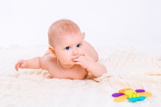 Cute baby girl on white background photo