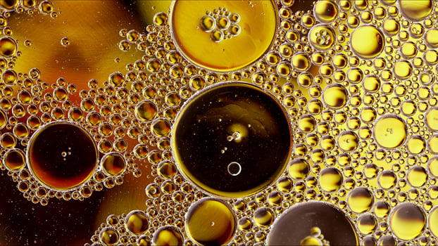 Abstract Colorful Food Oil Drops Bubbles and spheres Flowing on Water Surface photo