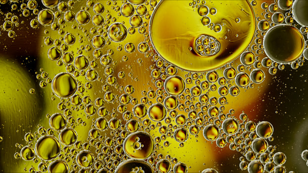 Abstract Colorful Food Oil Drops Bubbles and spheres Flowing on Water Surface photo