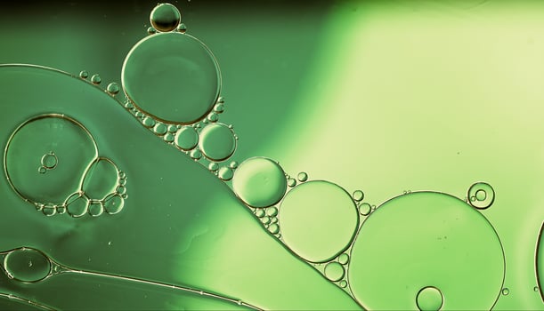 Abstract Colorful Food Oil Drops Bubbles and spheres Flowing on Water Surface photo