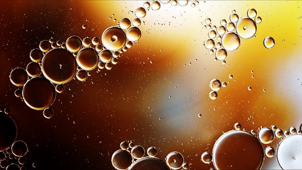 Abstract Colorful Food Oil Drops Bubbles and spheres Flowing on Water Surface photo