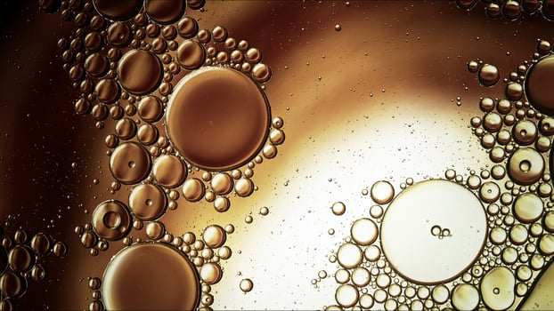 Abstract Colorful Food Oil Drops Bubbles and spheres Flowing on Water Surface photo