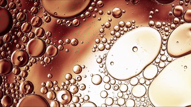 Abstract Colorful Food Oil Drops Bubbles and spheres Flowing on Water Surface photo
