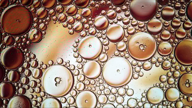 Abstract Colorful Food Oil Drops Bubbles and spheres Flowing on Water Surface photo