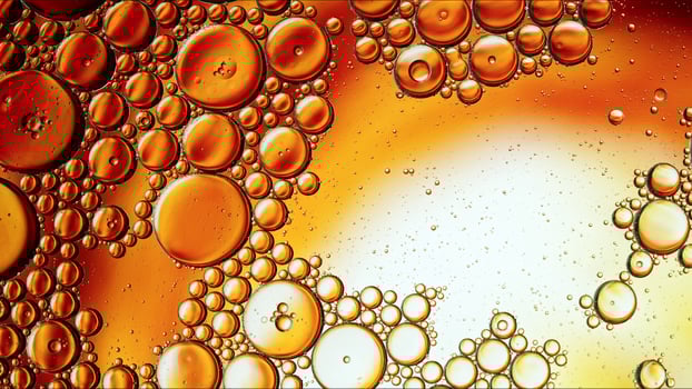 Abstract Colorful Food Oil Drops Bubbles and spheres Flowing on Water Surface photo