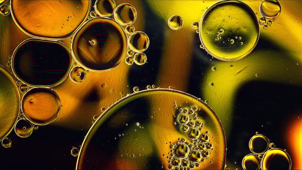 Abstract Colorful Food Oil Drops Bubbles and spheres Flowing on Water Surface photo