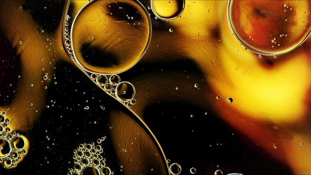 Abstract Colorful Food Oil Drops Bubbles and spheres Flowing on Water Surface photo