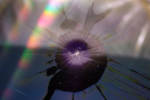 damaged LCD screen with cracks, full-frame background photo
