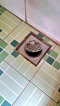 open floor drain ball in the bathroom, suitable for advertising bathroom cleaners and bathroom equipment photo