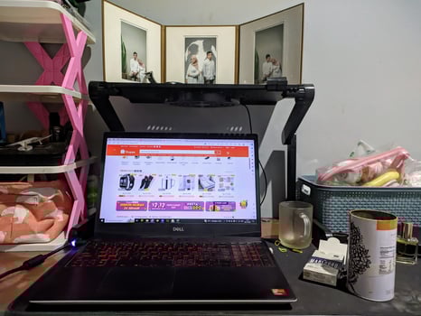 Jakarta, Indonesia. November 21, 2023. a laptop on the table opens the online shopping site Shopee photo