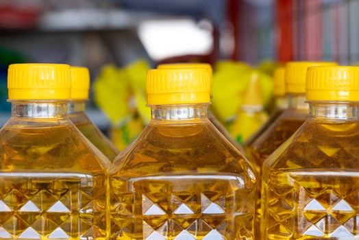 row of cooking oil in bottles photo
