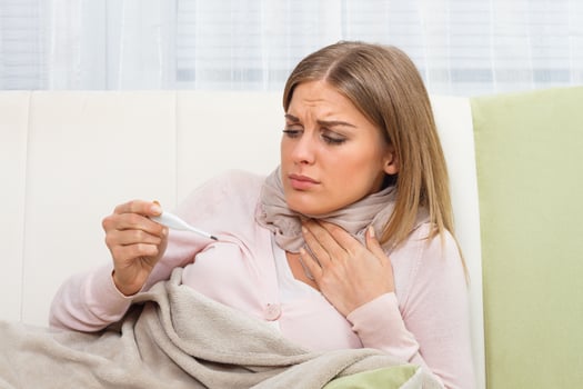 Woman is having sore throat photo