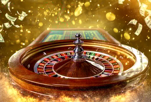 Collage of casino images with a close-up vibrant image of multicolored casino roulette table with poker chips photo