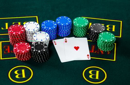 Poker play. Chips and cards photo