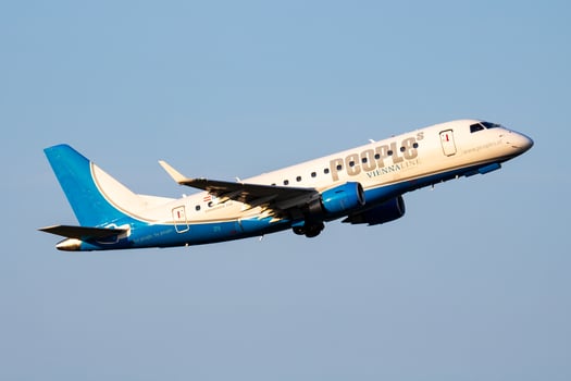 Vienna, Austria, 2018 - Peoples Viennaline Embraer ERJ-170 OE-LMK passenger plane departure and take off at Vienna Airport photo