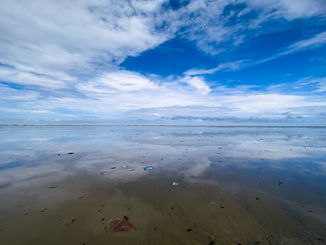 The view of the sea is beautiful, but unfortunately there is a lot of rubbish around the beach photo