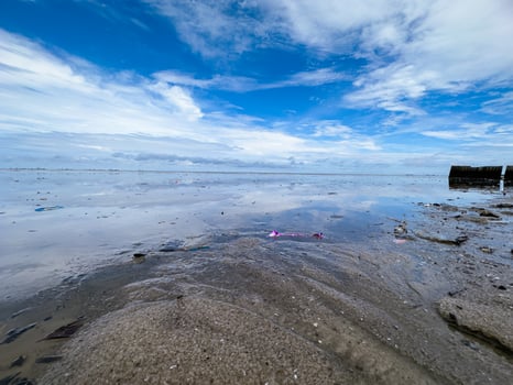 The view of the sea is beautiful, but unfortunately there is a lot of rubbish around the beach photo