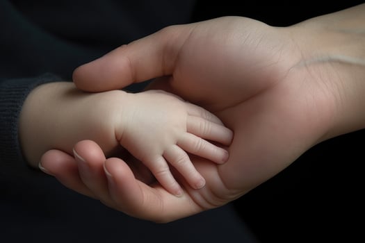 AI generated Mother holding her baby hand, closeup shot, isolated on black, A newborn baby and mother holding hands on a white background, hands close up, no hand deformation, AI Generated photo