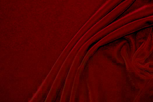 red velvet fabric texture used as background. Empty red fabric background of soft and smooth textile material. There is space for text... photo