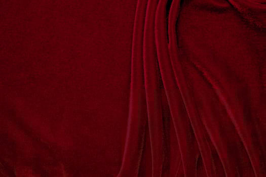 red velvet fabric texture used as background. Empty red fabric background of soft and smooth textile material. There is space for text... photo
