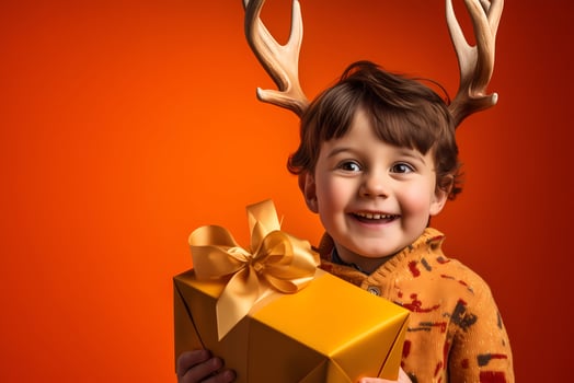 AI generated Happy little boy in reindeer antlers on a bright background. Give gifts. New year sales, advertising, discounts. photo